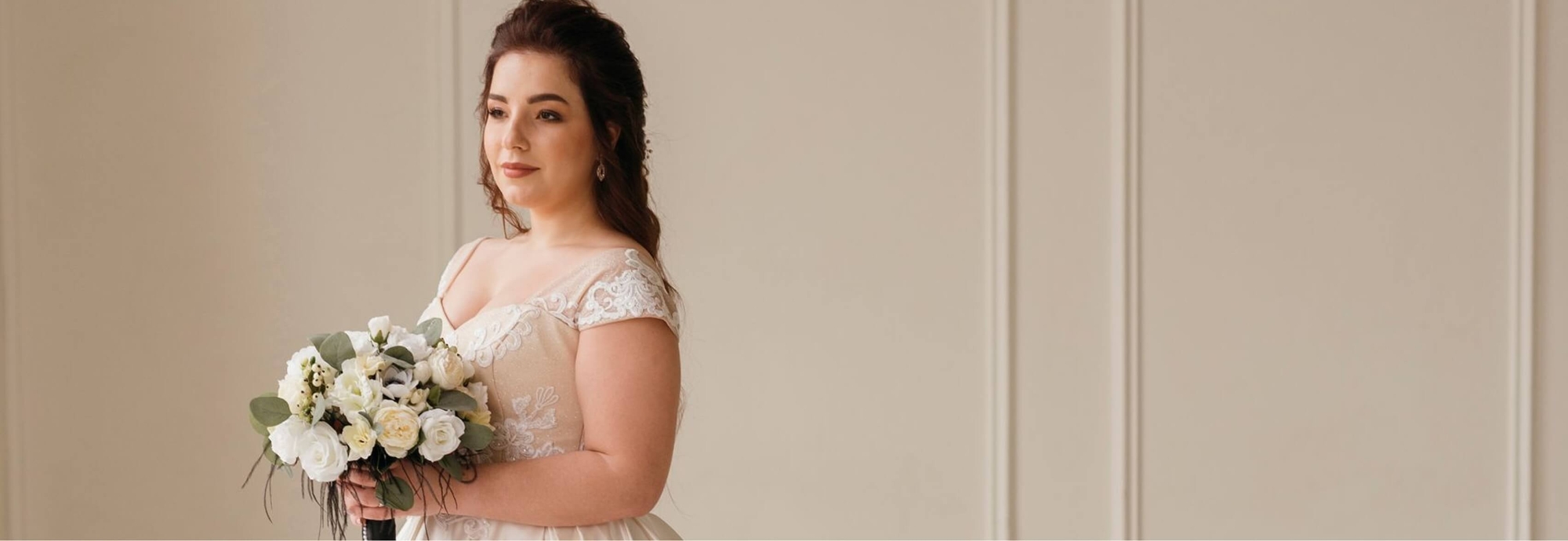 Сouple wearing a blue gown and a black suit