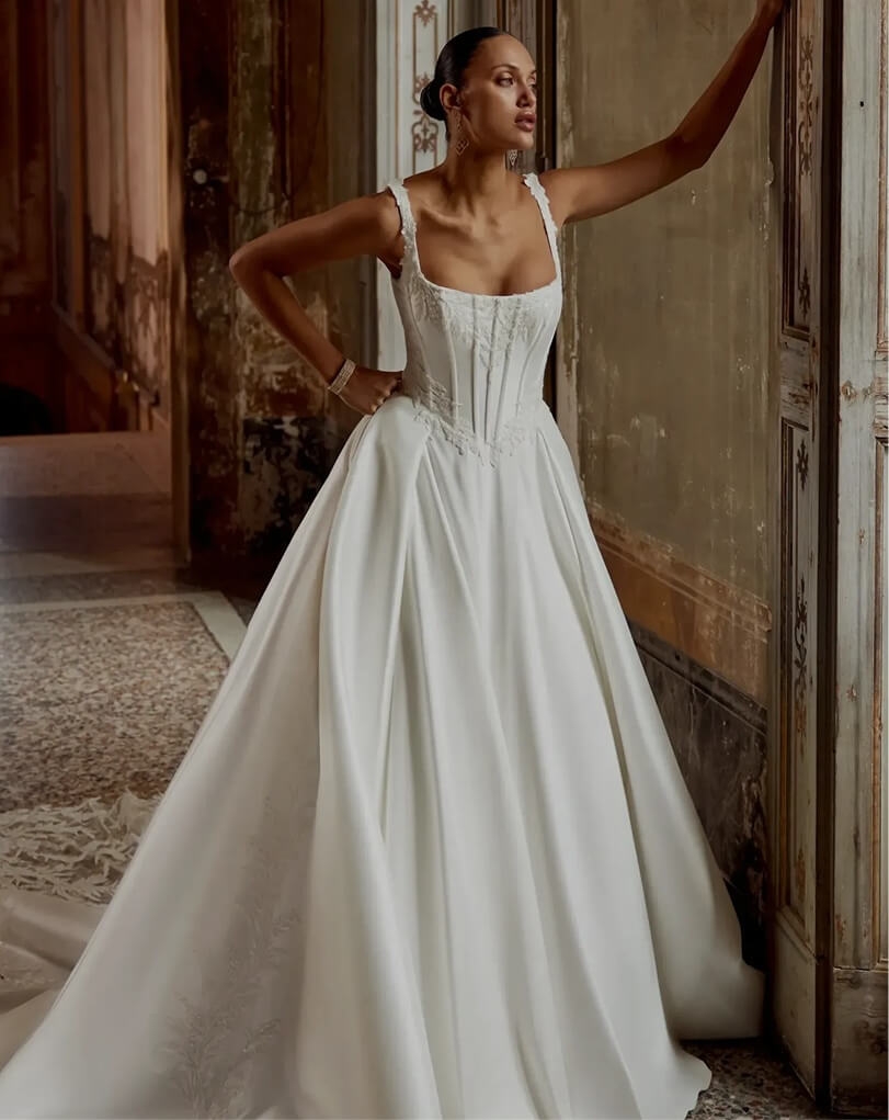 Model wearing a white dress