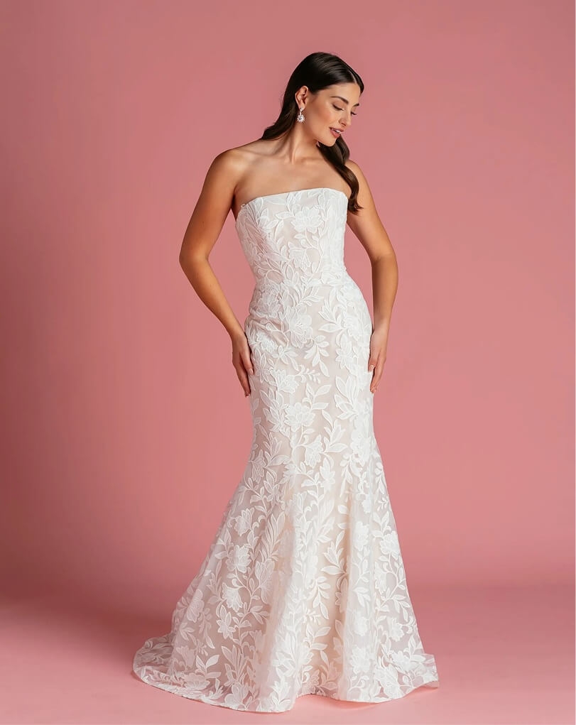 Models wearing a gown by Lis SImon